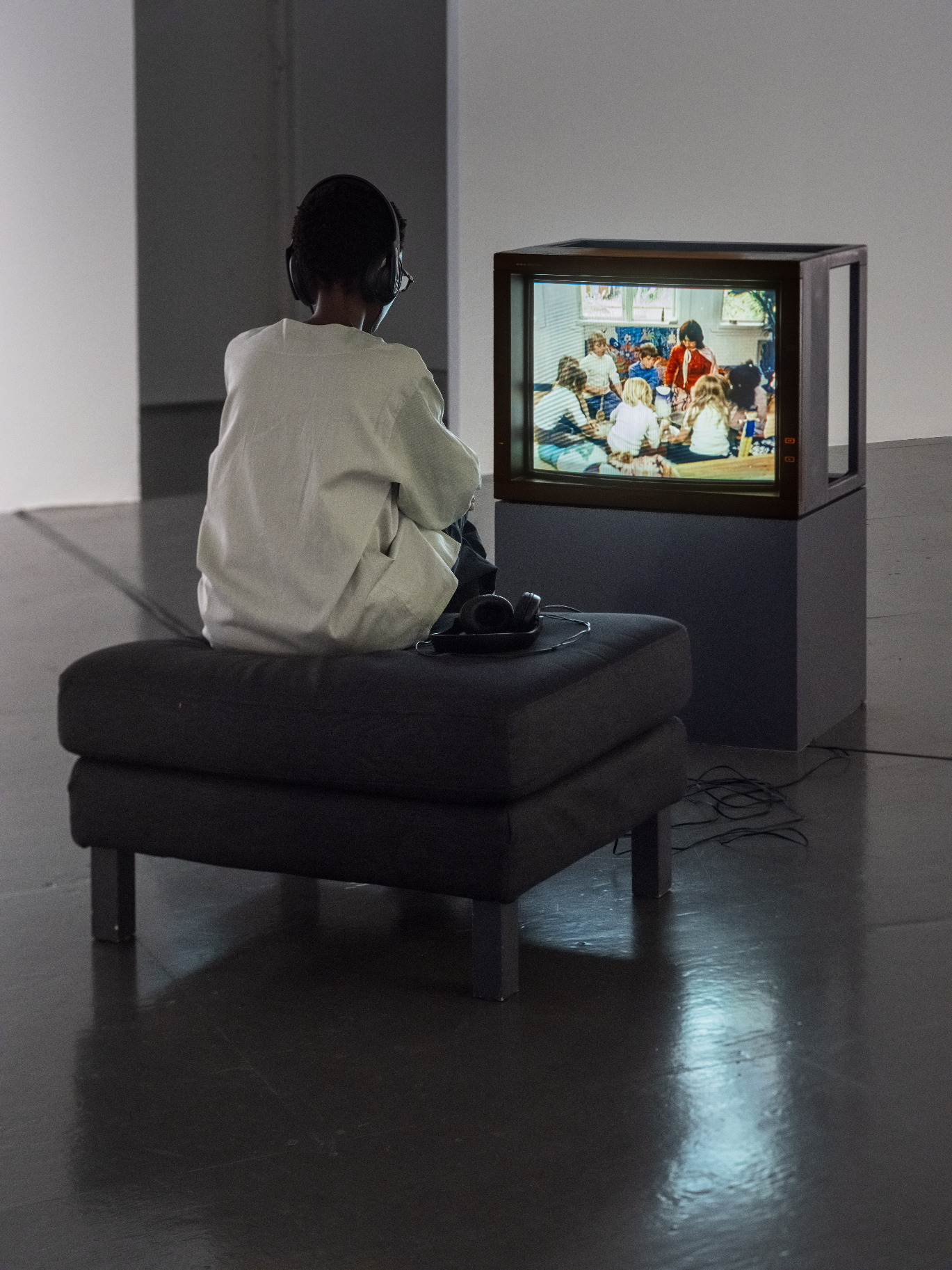 Person watching archive materials from Don Cherry.